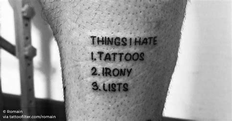I hate tattoos .